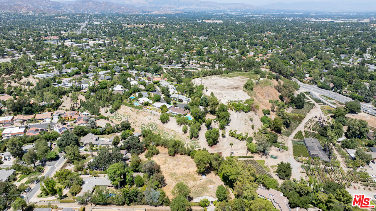 23621 Long Valley Road Hidden Hills, CA 91302 - Photo 10 of 26 an aerial view of residential houses with outdoor space and trees