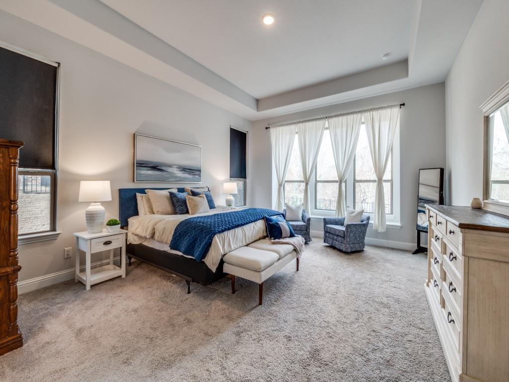 2112 Deer Run Court Gunter, TX 75058 - Photo 21 of 32 a spacious bedroom with a bed and a large window