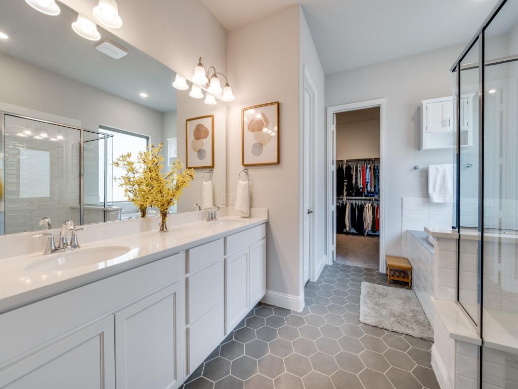2112 Deer Run Court Gunter, TX 75058 - Photo 22 of 32 a spacious bathroom with a double vanity sink shower and a mirror