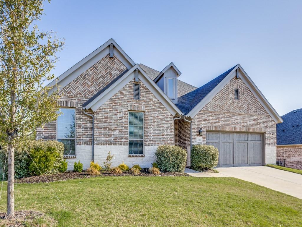 2112 Deer Run Court Gunter, TX 75058 - Photo 27 of 32 a front view of a house with a yard