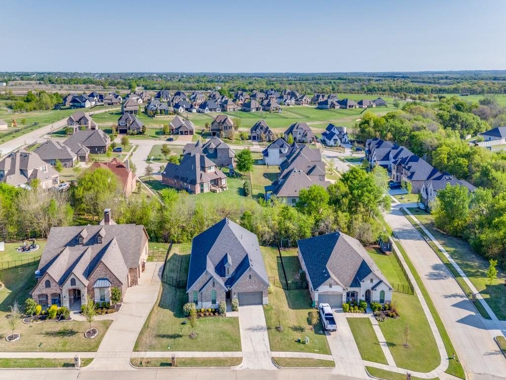 2112 Deer Run Court Gunter, TX 75058 - Photo 30 of 32 an aerial view of residential houses with outdoor space