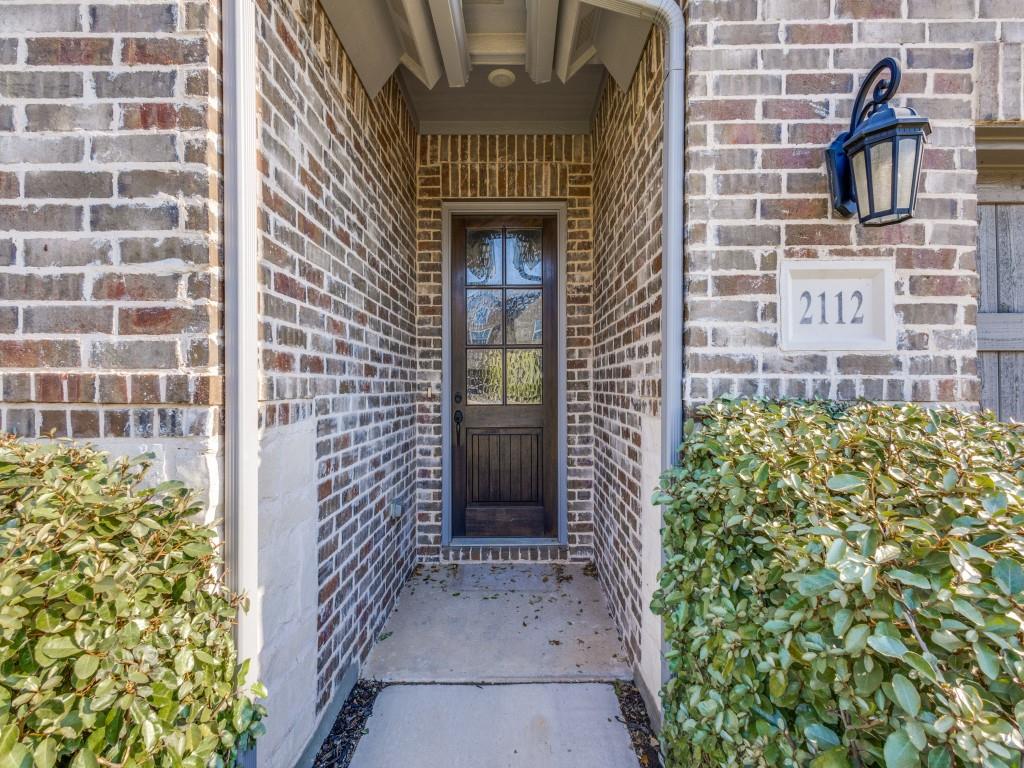 2112 Deer Run Court Gunter, TX 75058 - Photo 4 of 32 a front view of a house