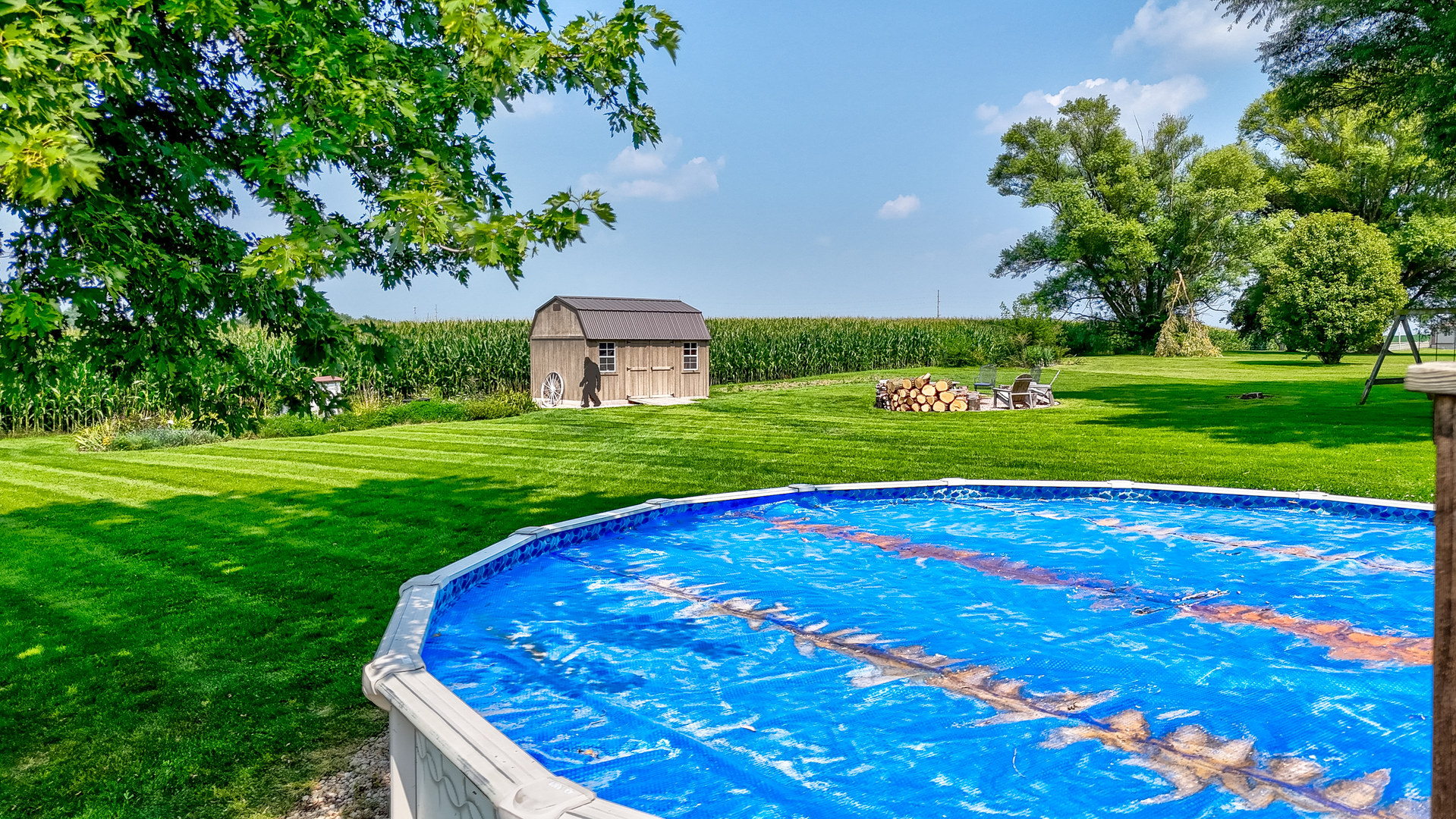 2383 North 3119th Road Marseilles, IL 61341 - Photo 17 of 19 a view of a backyard with large trees
