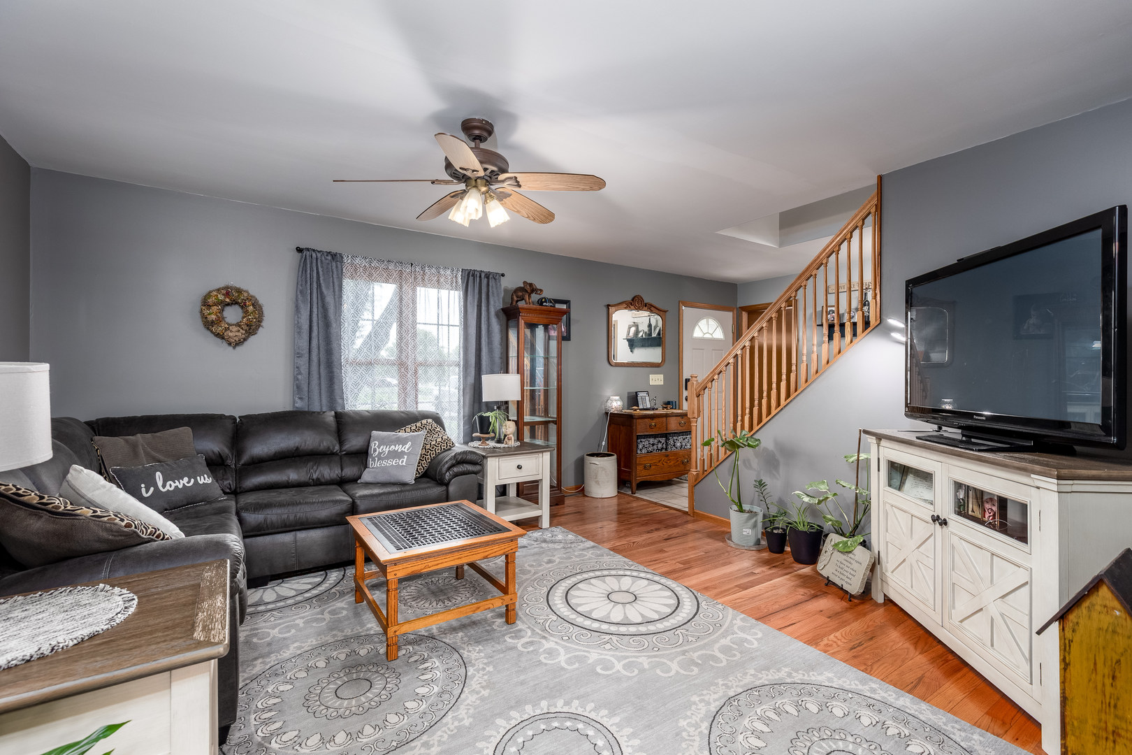 2383 North 3119th Road Marseilles, IL 61341 - Photo 3 of 19 a living room with furniture and a flat screen tv