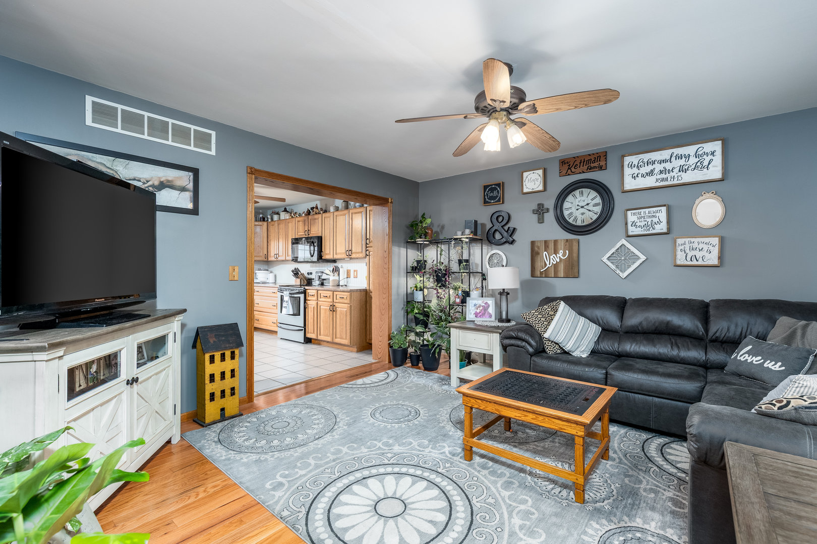 2383 North 3119th Road Marseilles, IL 61341 - Photo 4 of 19 a living room with furniture and a flat screen tv