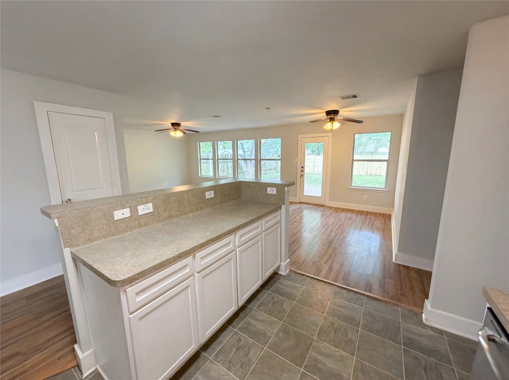 414 Binnacle Way Crosby, TX 77532 - Photo 16 of 22 a kitchen with a sink and wooden floor