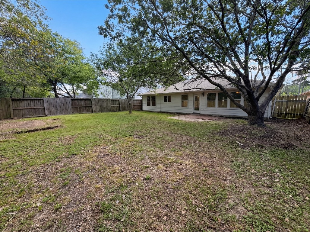414 Binnacle Way Crosby, TX 77532 - Photo 5 of 22 a front view of a house with a yard and trees