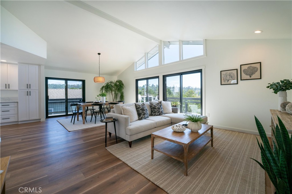675 Huntington Road Cambria, CA 93428 - Photo 6 of 30 a living room with furniture and wooden floor