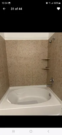 a bathroom with a sink a vanity and a mirror