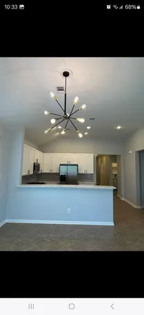 a view of kitchen with stove