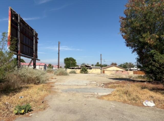 53175 Cesar Chavez Street Coachella, CA 92236 - Photo 2 of 11 a view of a yard with a tree