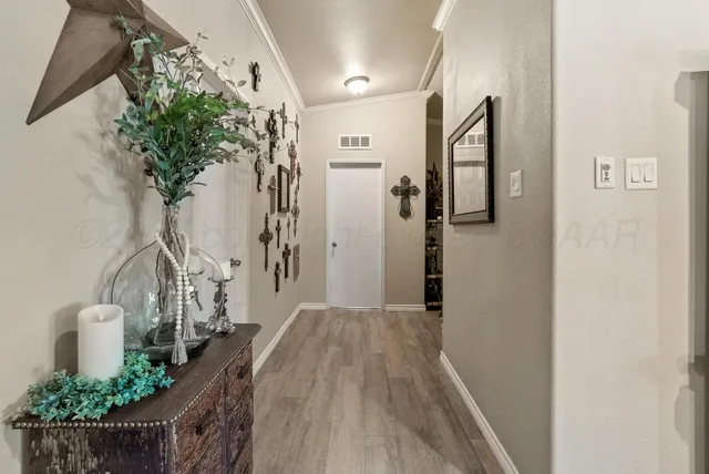 a view of entryway with wooden floor