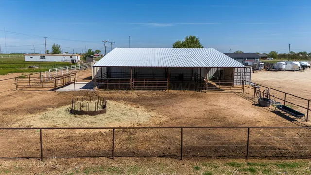 a view of a lake with houses in the back
