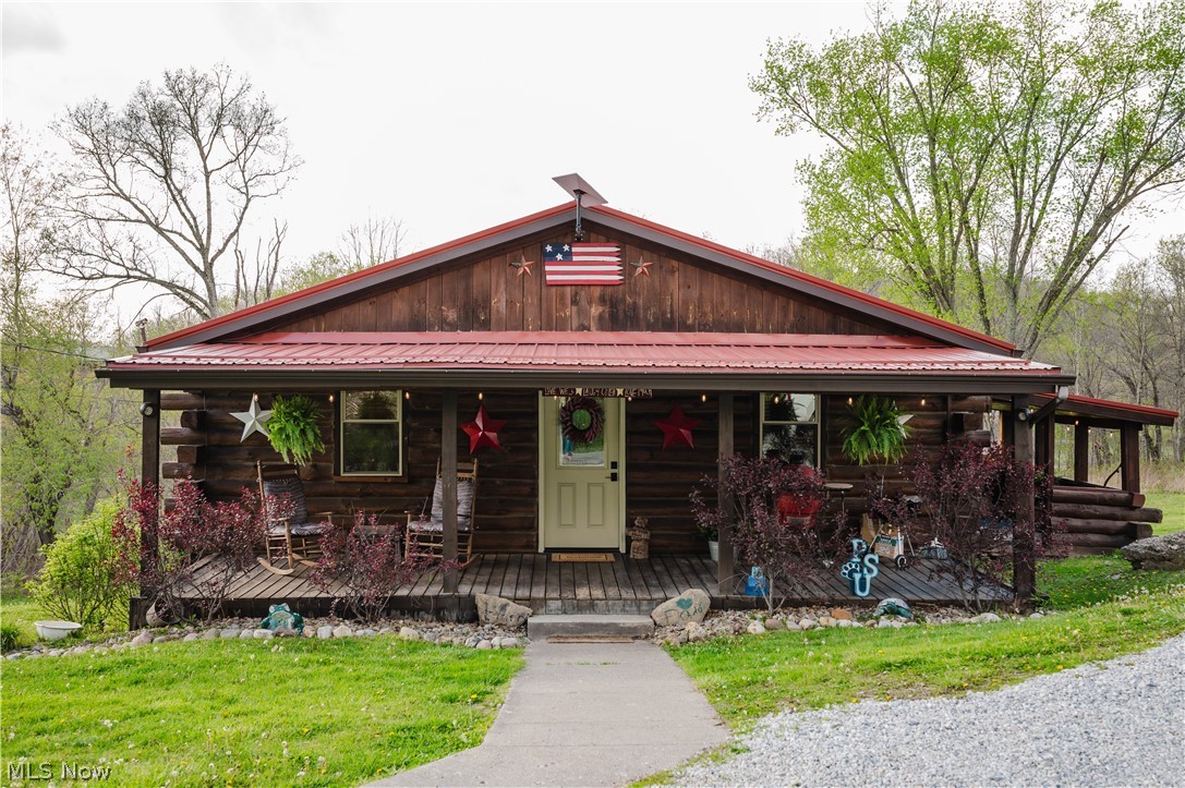 47480 Unionvale Road Cadiz, OH 43907 - Photo 1 of 37 Exterior view of residence featuring a welcoming front porch