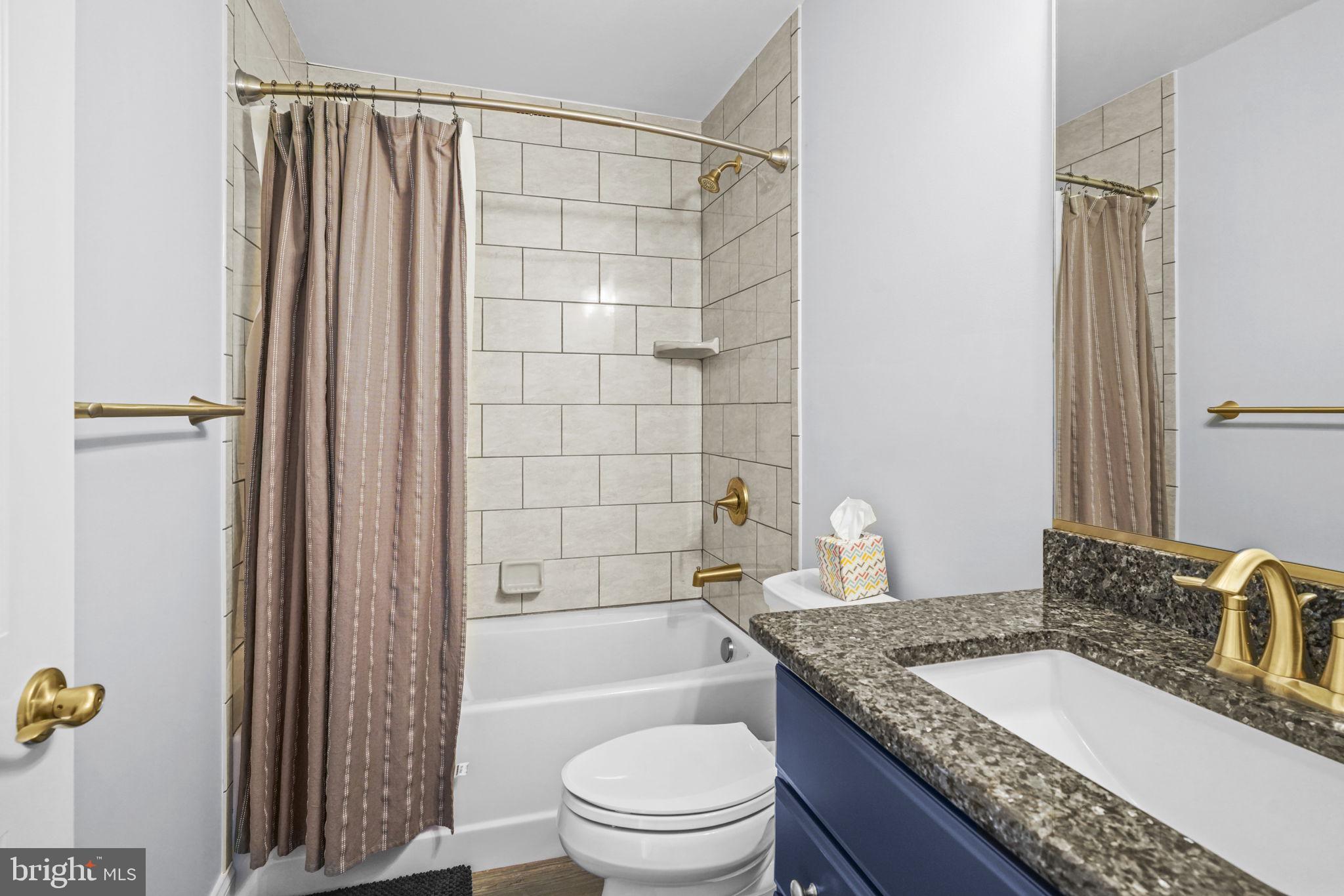 5965 Rockhold Creek Road Deale, MD 20751 - Photo 42 of 64 Upper level hallway bathroom