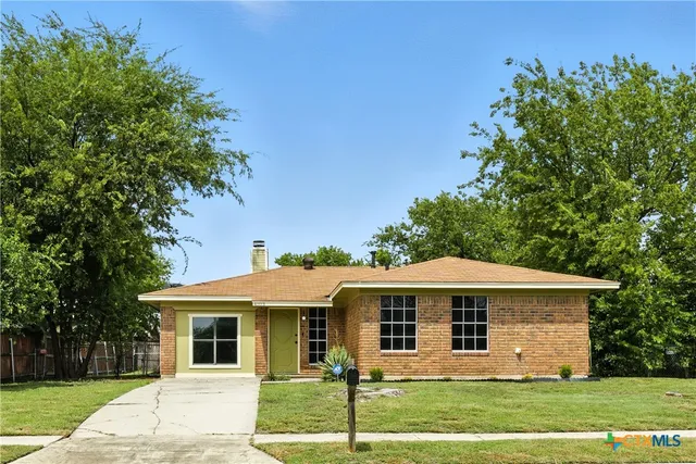 a front view of a house with a porch