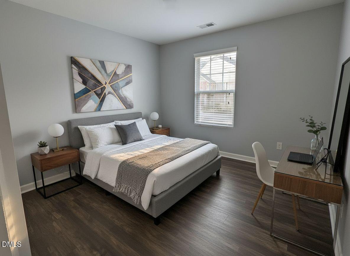 4438 Hillsgrove Road Wake Forest, NC 27587 - Photo 11 of 16 a bedroom with a bed and wooden floor