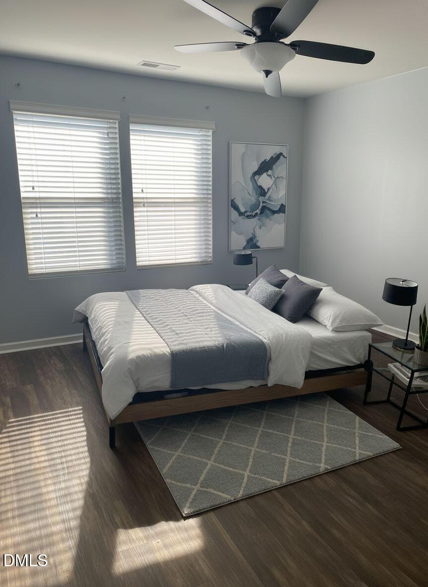 4438 Hillsgrove Road Wake Forest, NC 27587 - Photo 9 of 16 a bedroom with a bed and window