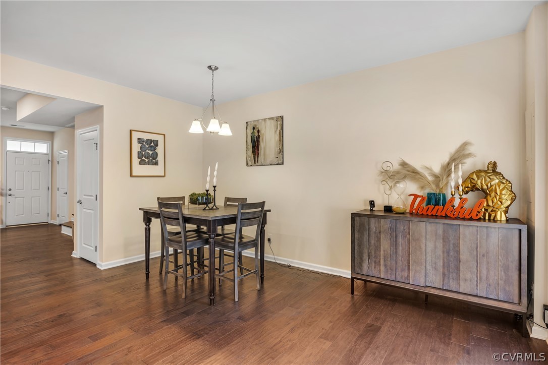 5724 Riverside Place Richmond, VA 23225 - Photo 20 of 47 a view of a dining room with furniture and wooden floor