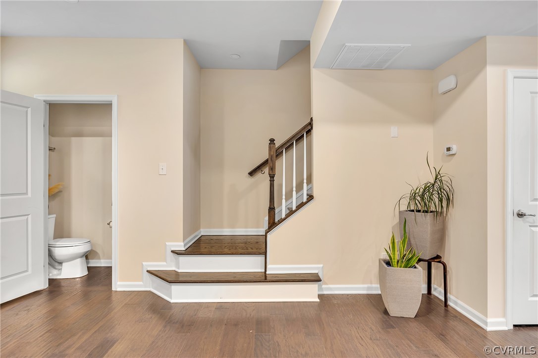 5724 Riverside Place Richmond, VA 23225 - Photo 22 of 47 a view of an entryway with wooden floor