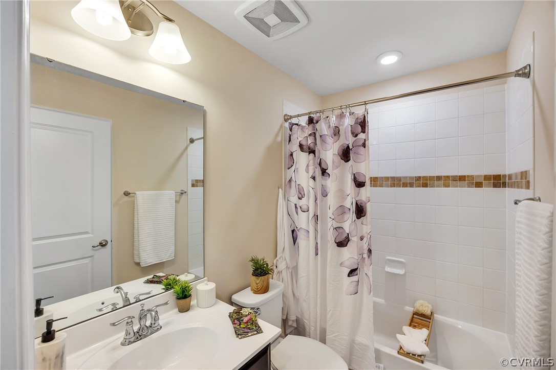 5724 Riverside Place Richmond, VA 23225 - Photo 31 of 47 a bathroom with a sink toilet and shower