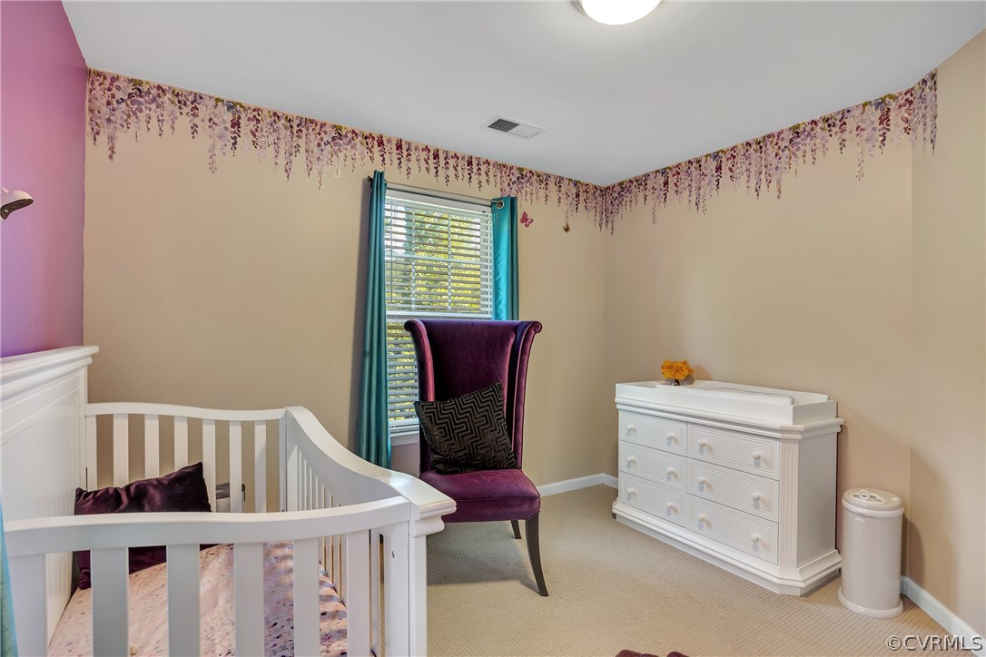 5724 Riverside Place Richmond, VA 23225 - Photo 35 of 47 a view of a bedroom with furniture and windows