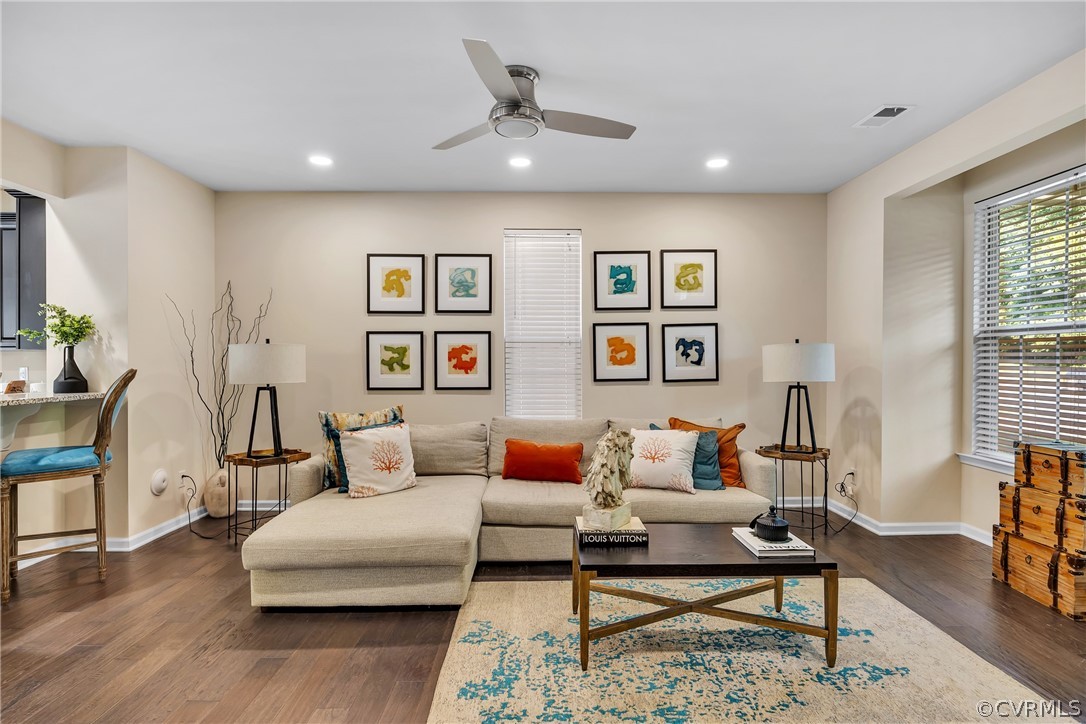 5724 Riverside Place Richmond, VA 23225 - Photo 9 of 47 a living room with furniture and wooden floor