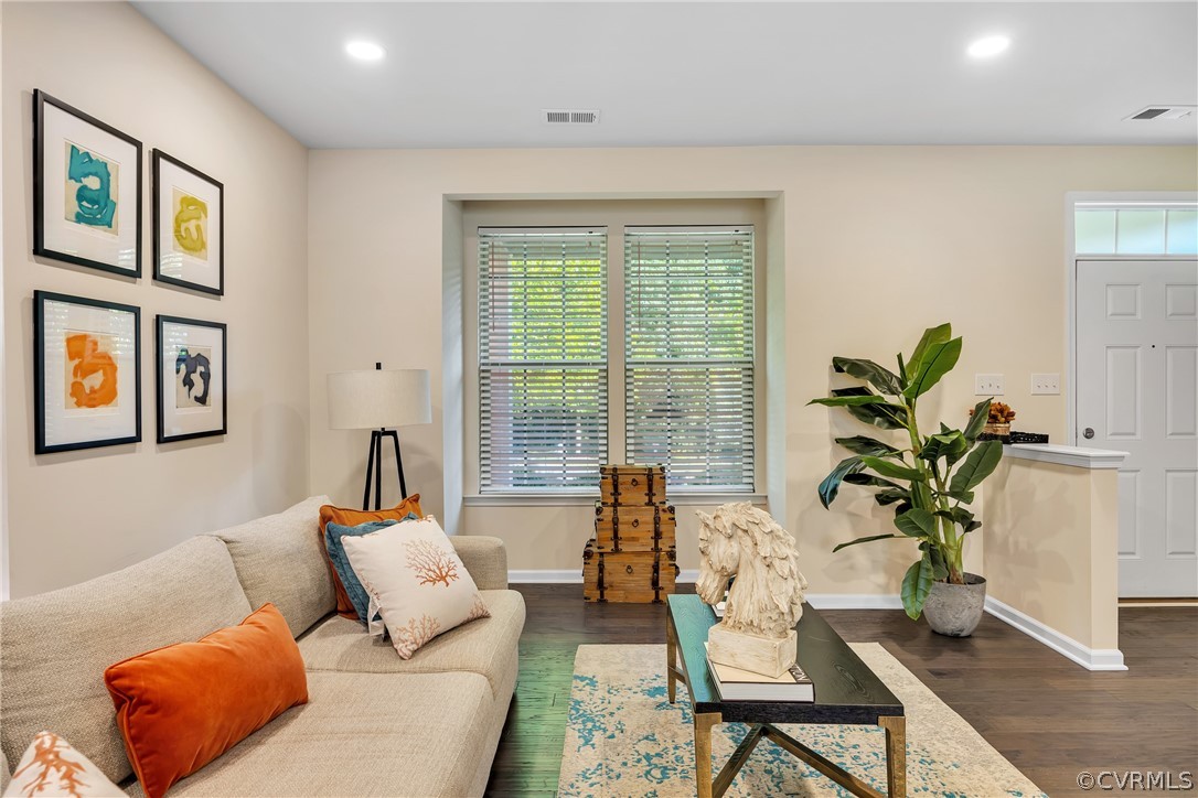 5724 Riverside Place Richmond, VA 23225 - Photo 10 of 47 a living room with furniture plant and a window