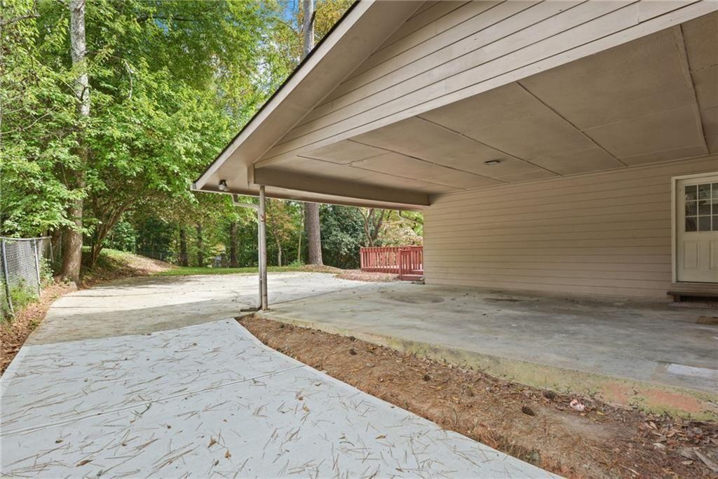 705 Edgewater Trail Sandy Springs, GA 30328 - Photo 33 of 36 a view of a backyard