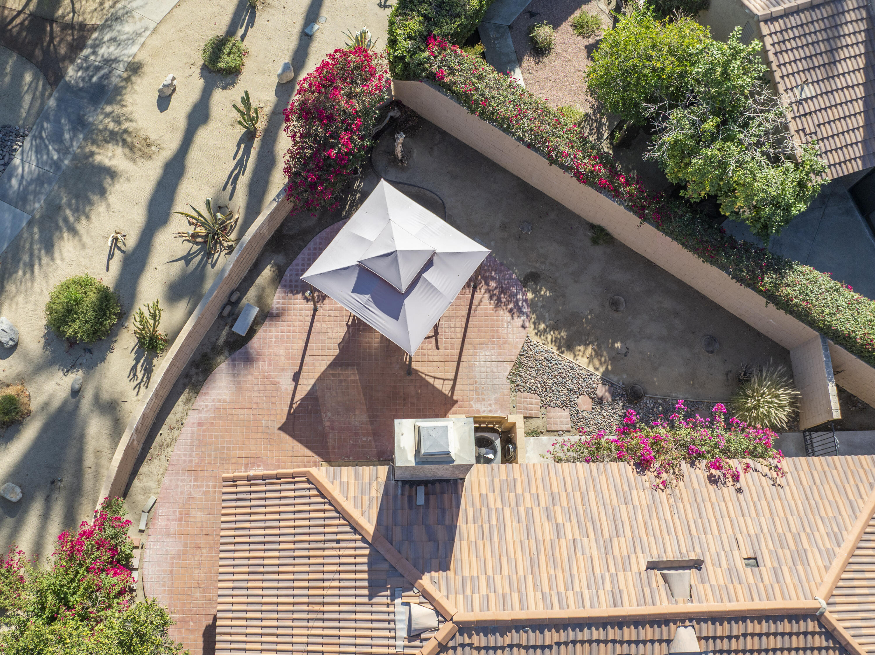 44695 Monaco Circle Palm Desert, CA 92260 - Photo 31 of 58 an outdoor space with lots of flowers