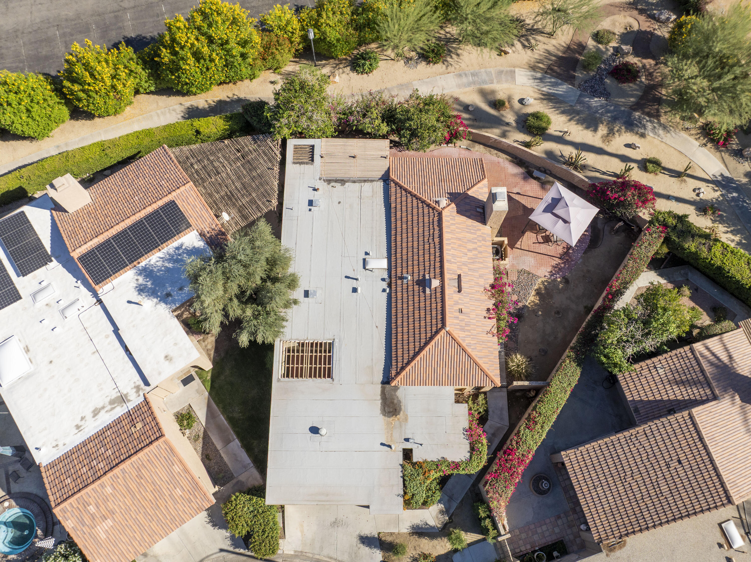 44695 Monaco Circle Palm Desert, CA 92260 - Photo 32 of 58 an aerial view of a house with a yard