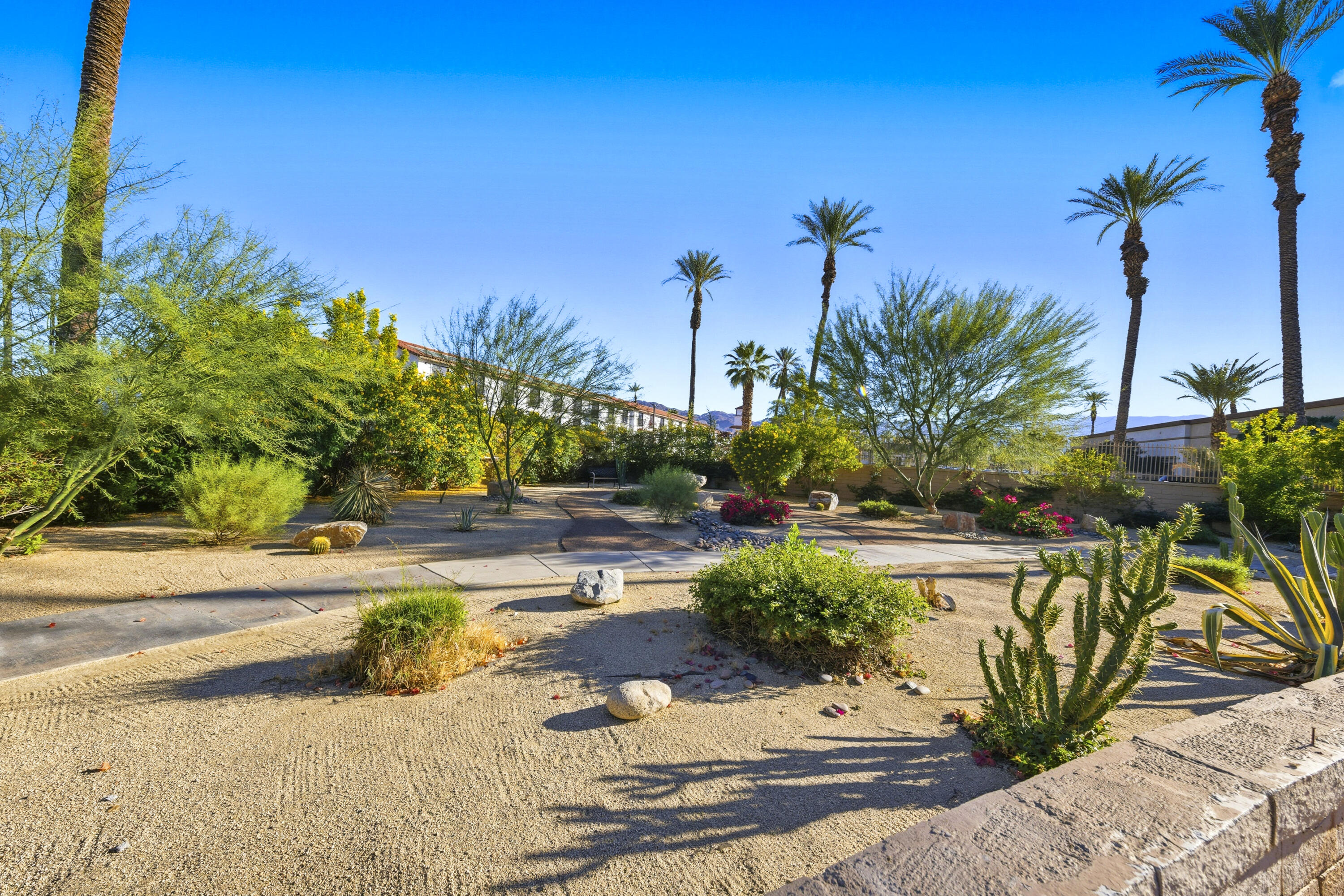 44695 Monaco Circle Palm Desert, CA 92260 - Photo 39 of 58 a view of a backyard