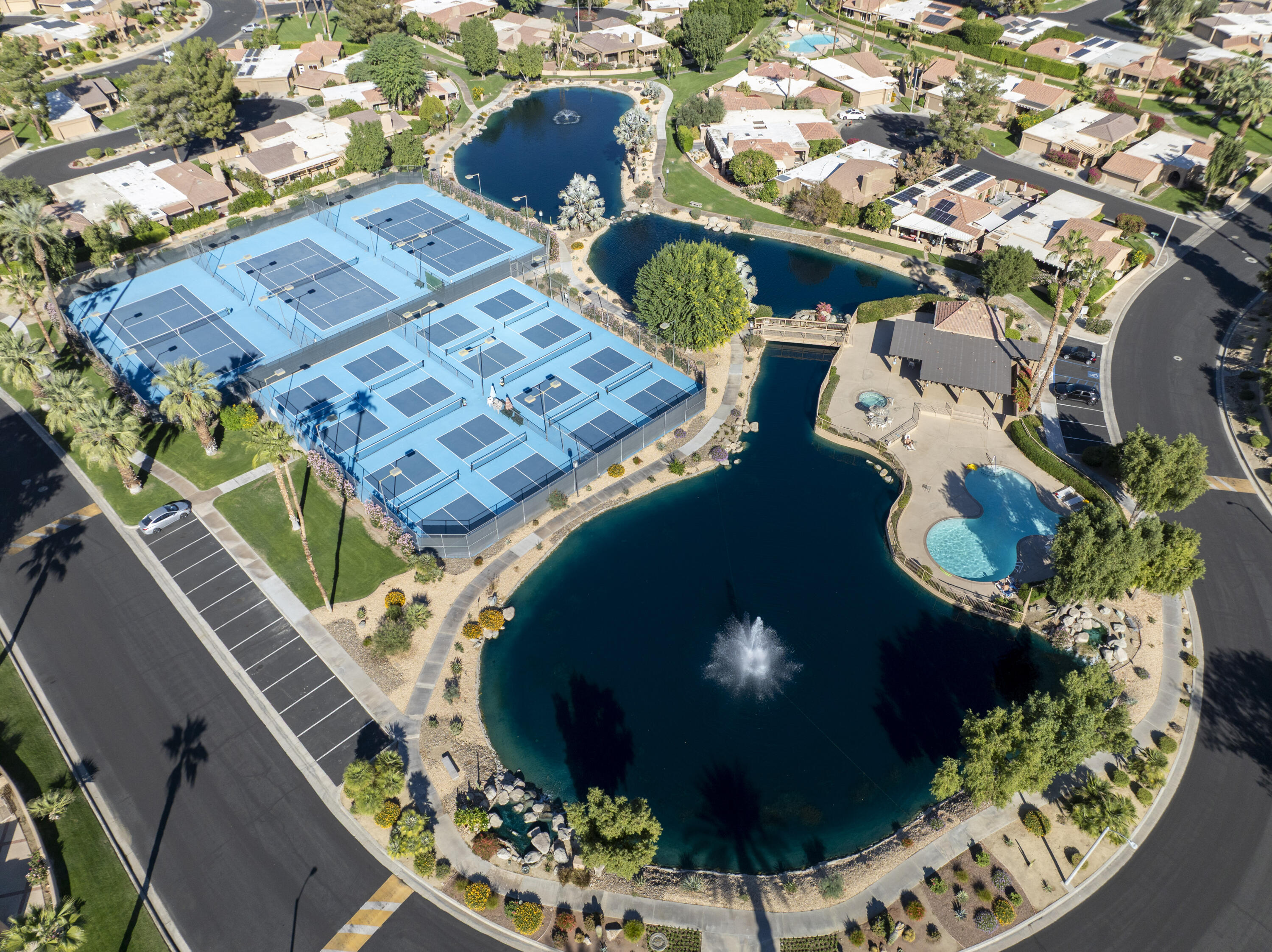44695 Monaco Circle Palm Desert, CA 92260 - Photo 50 of 58 an aerial view of a house a yard and a fireplace