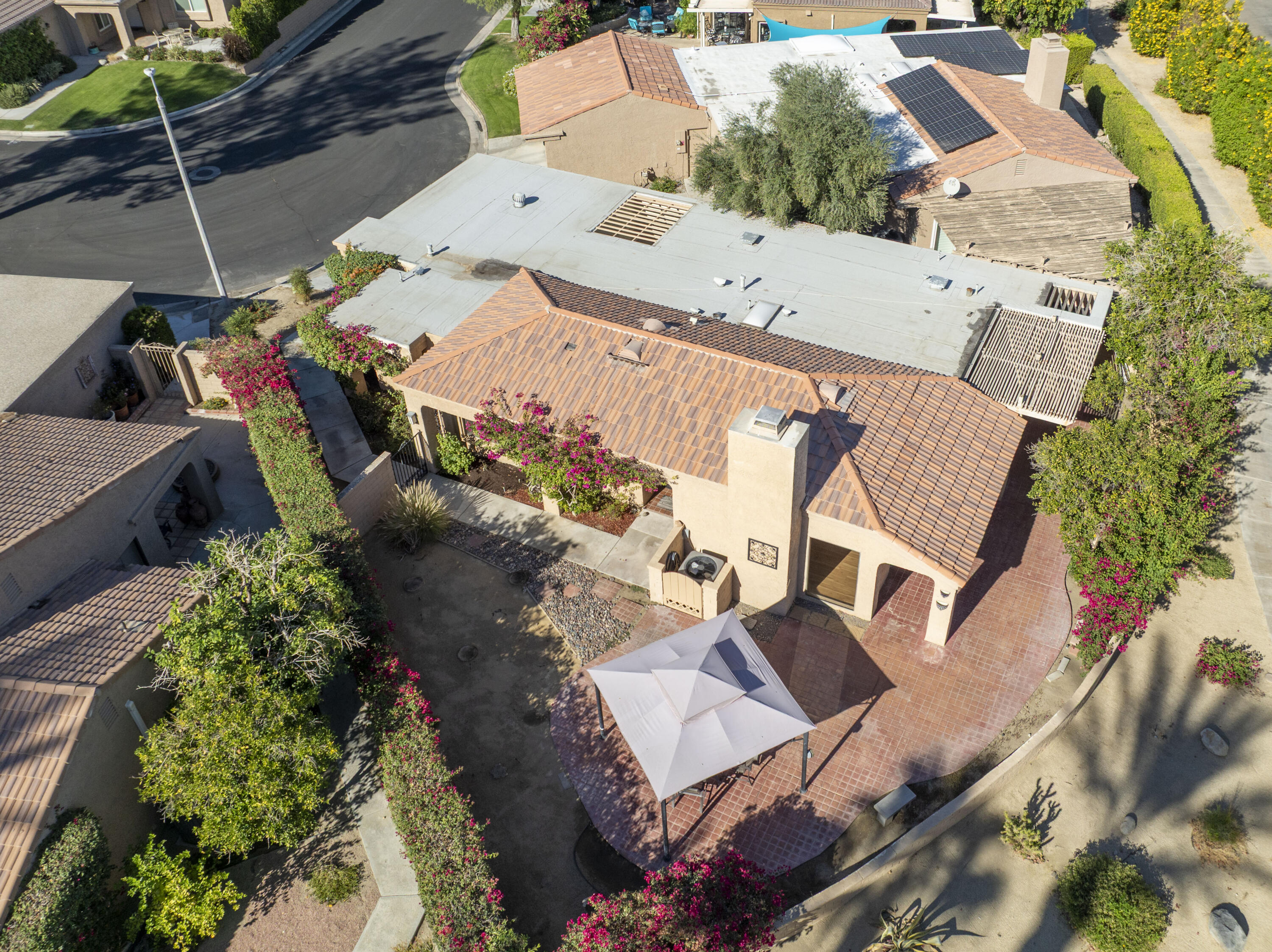 44695 Monaco Circle Palm Desert, CA 92260 - Photo 6 of 58 an aerial view of a house with a garden