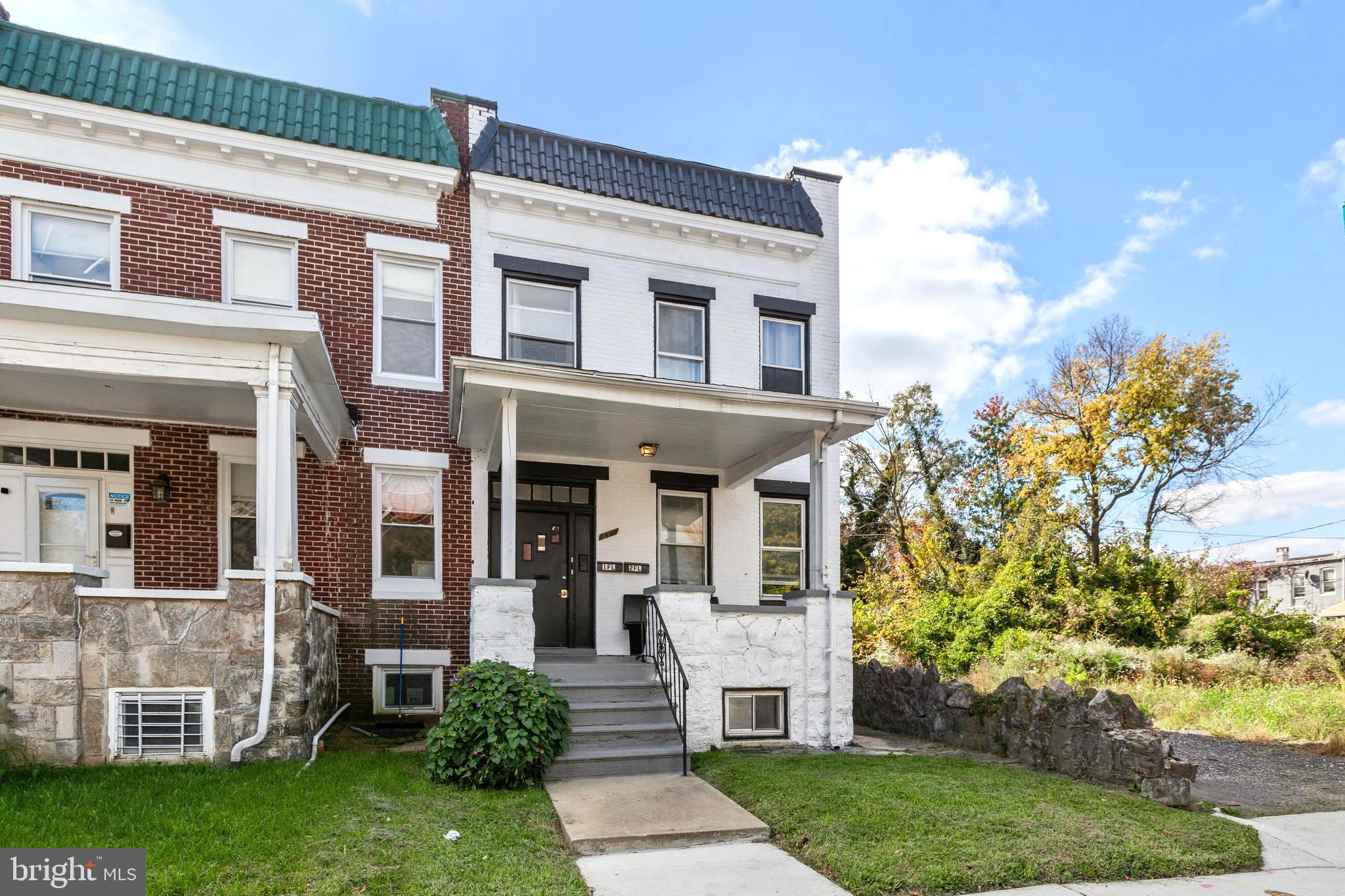 a house view with a garden space