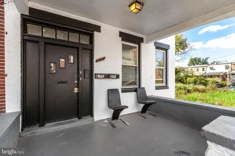 a view of a room with a large window