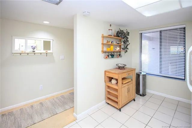 a bathroom with a sink a mirror and shower