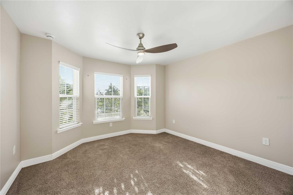 9984 Spring Gulch Lane Punta Gorda, FL 33950 - Photo 14 of 31 a view of an empty room with a window