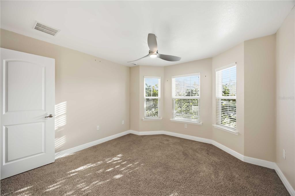 9984 Spring Gulch Lane Punta Gorda, FL 33950 - Photo 16 of 31 a view of an empty room with a window