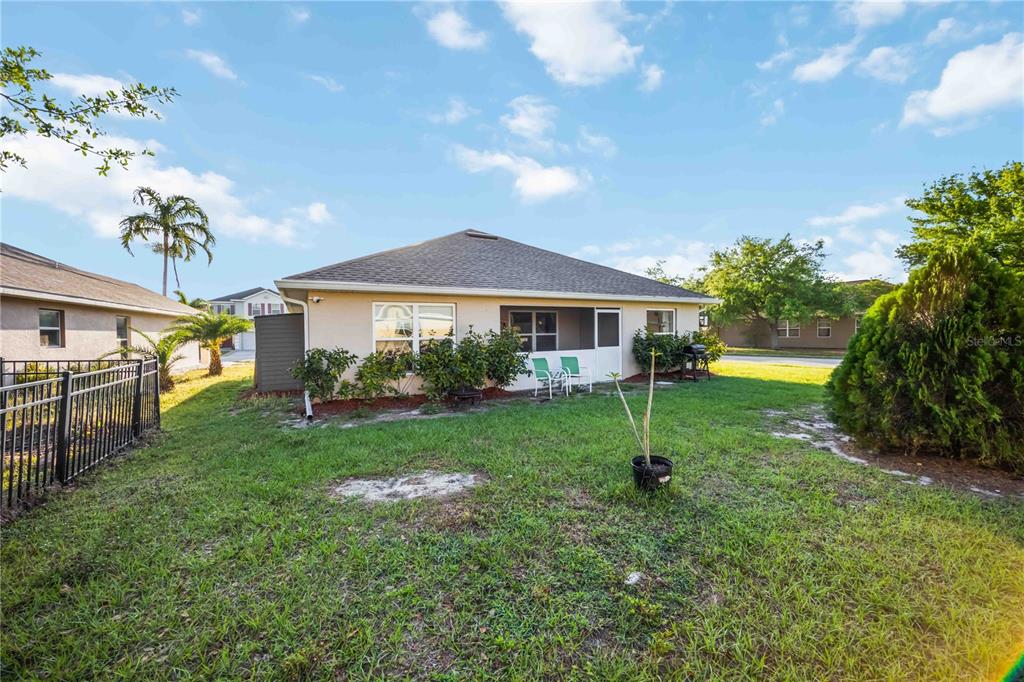 9984 Spring Gulch Lane Punta Gorda, FL 33950 - Photo 30 of 31 a house view with a garden space
