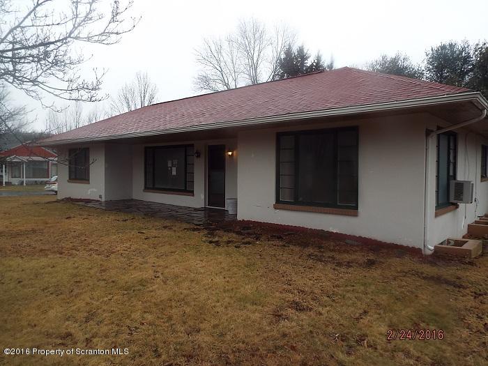 507 O'Hara Road Moscow, PA 18444 - Photo 1 of 13 a house with yard in front of it