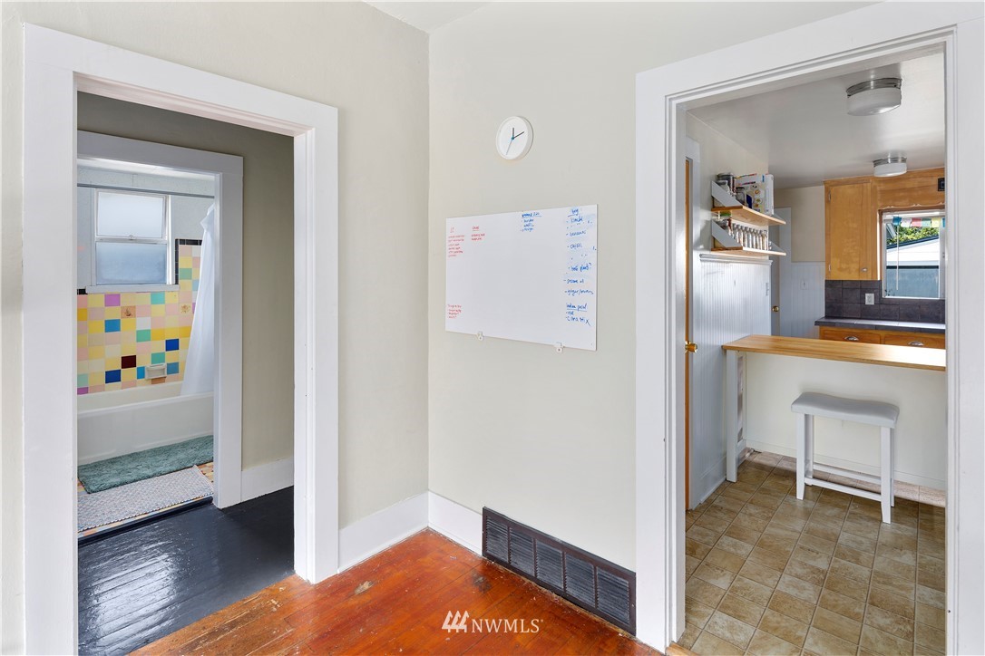 1706 North 50th Street Seattle, WA 98103 - Photo 7 of 18 a view of kitchen with livingroom and furniture