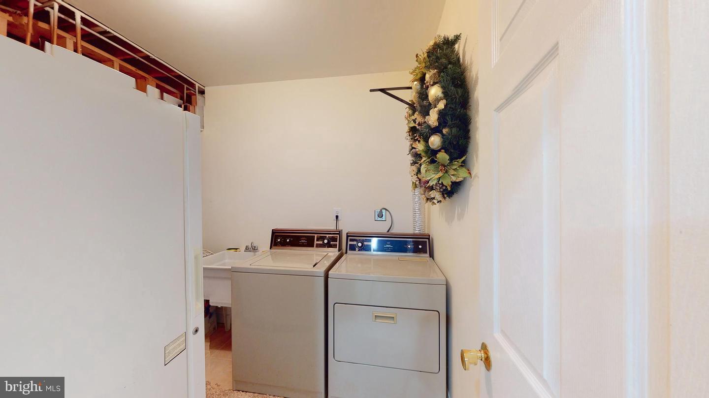 9710 Middleton Ridge Road Vienna, VA 22182 - Photo 23 of 25 Private Laundry Room