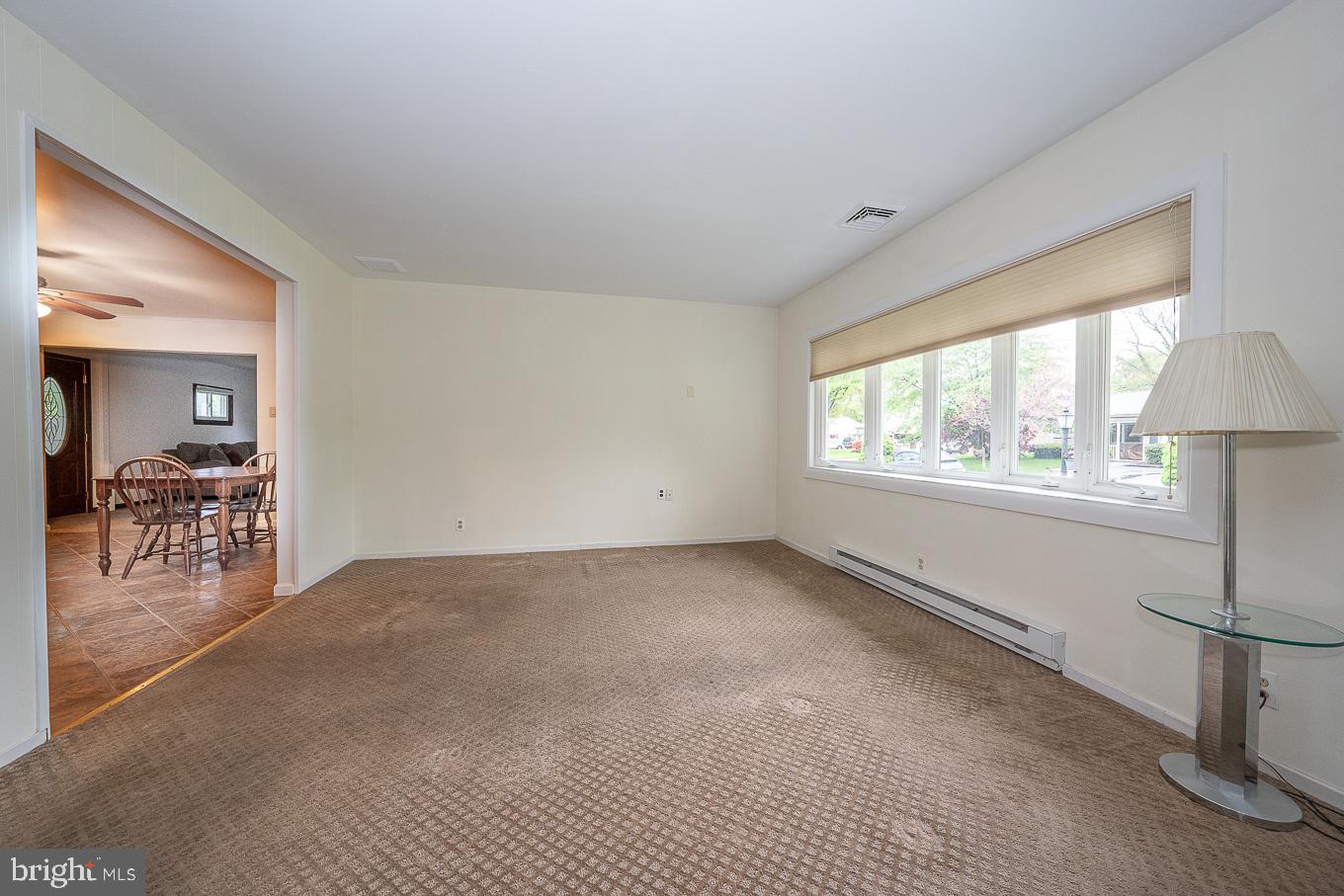 442 Norma Road Ambler, PA 19002 - Photo 6 of 51 Carpeted living room with terrific natural light