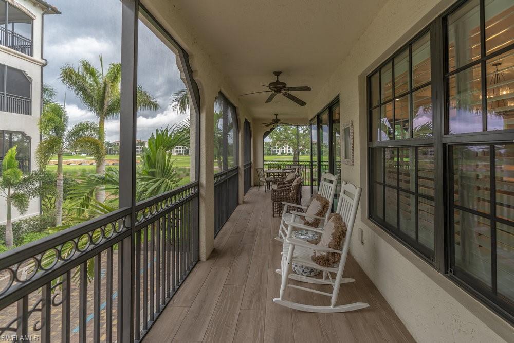 16375 Viansa Way, Unit 102 Naples, FL 34110 - Photo 27 of 40 a view of a balcony with chairs