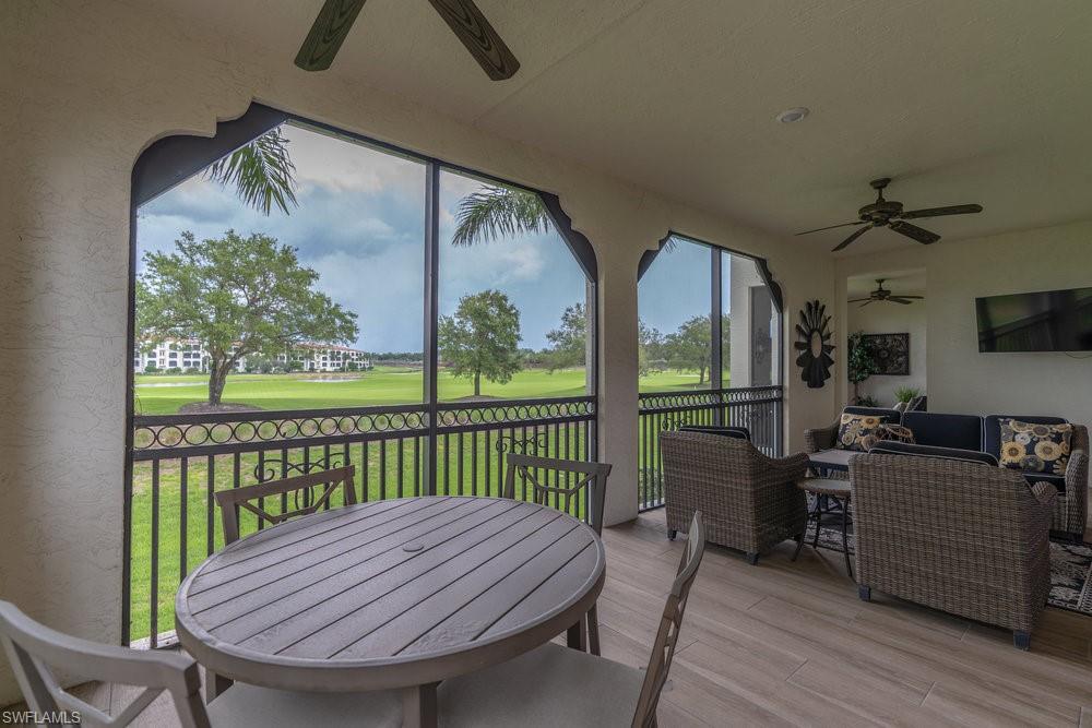 16375 Viansa Way, Unit 102 Naples, FL 34110 - Photo 28 of 40 a view of a porch with furniture