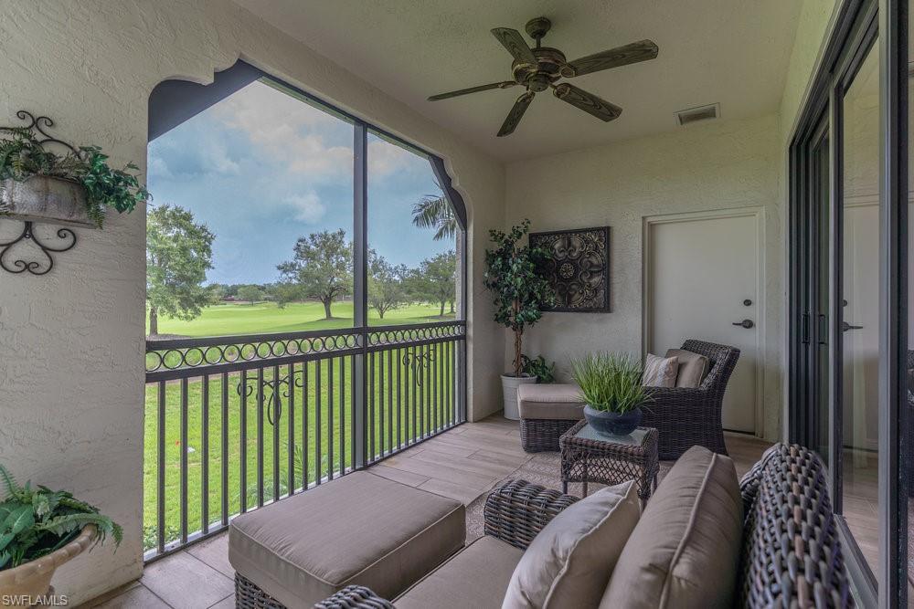 16375 Viansa Way, Unit 102 Naples, FL 34110 - Photo 30 of 40 a view of a balcony with furniture