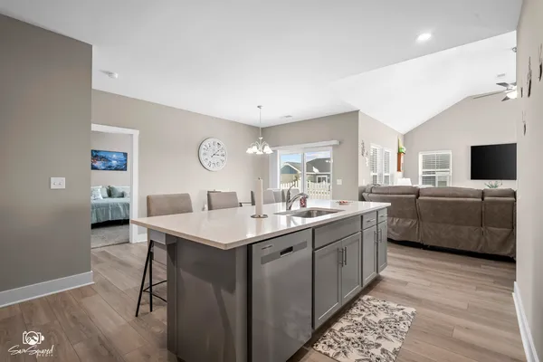 a view of a dining room with furniture and window