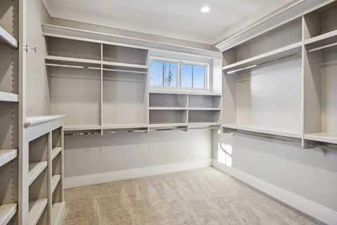 a bathroom with a double vanity sink and mirror