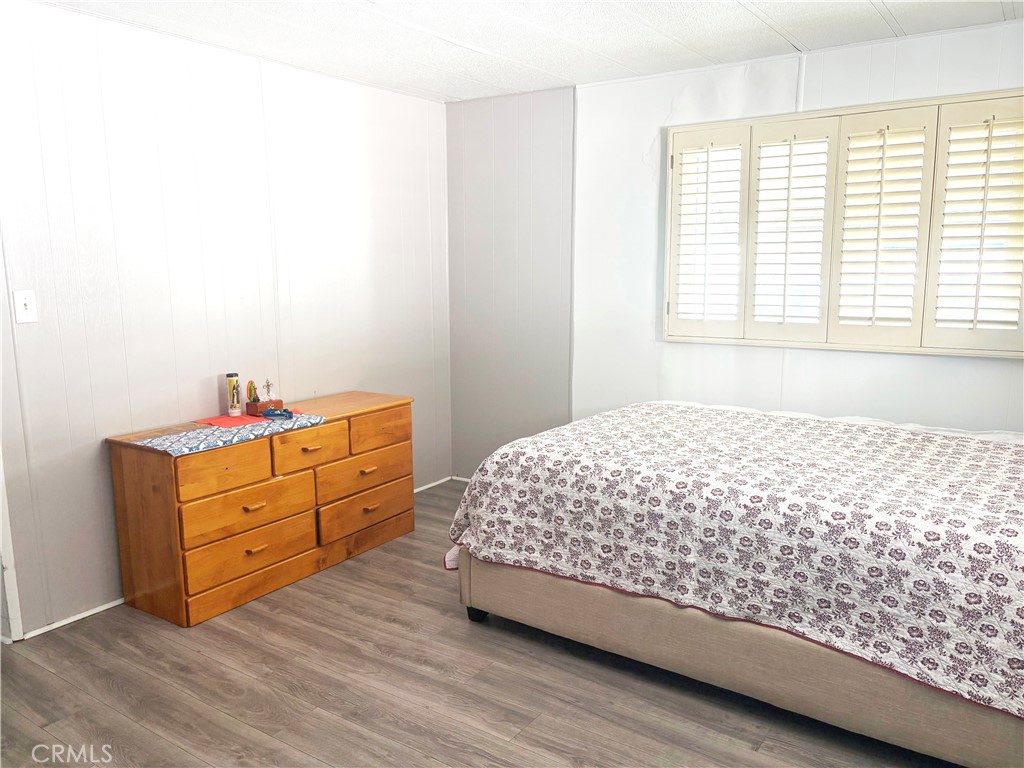 14851 Jeffrey Road, Unit 248 Irvine, CA 92618 - Photo 6 of 6 a bedroom with a bed and a window